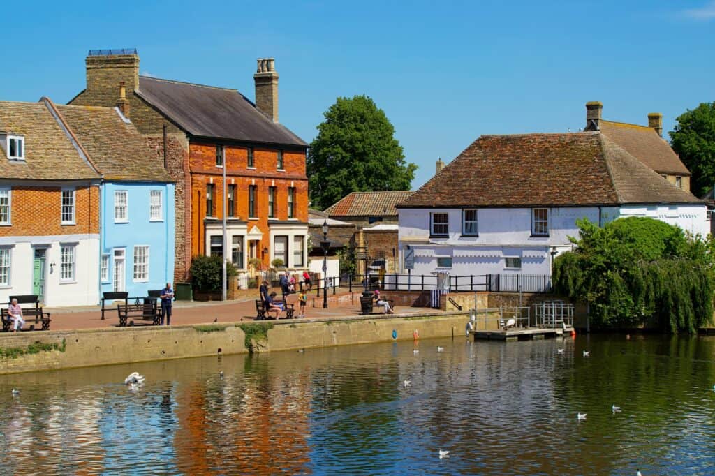 A village by the river on a sunny day