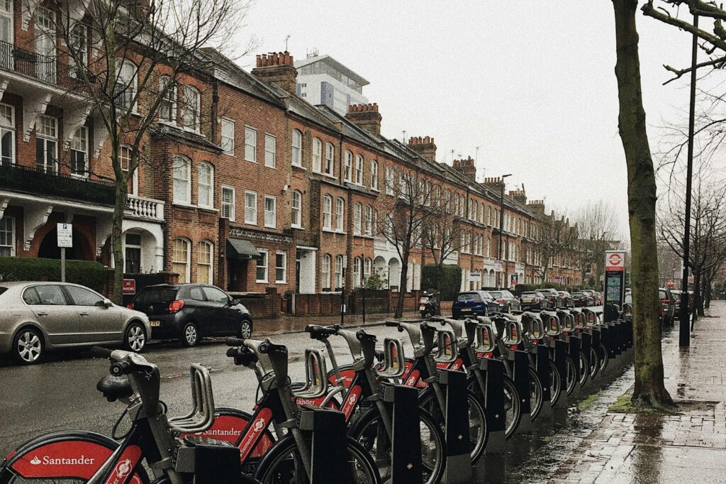 Cars packed outside the brick houses