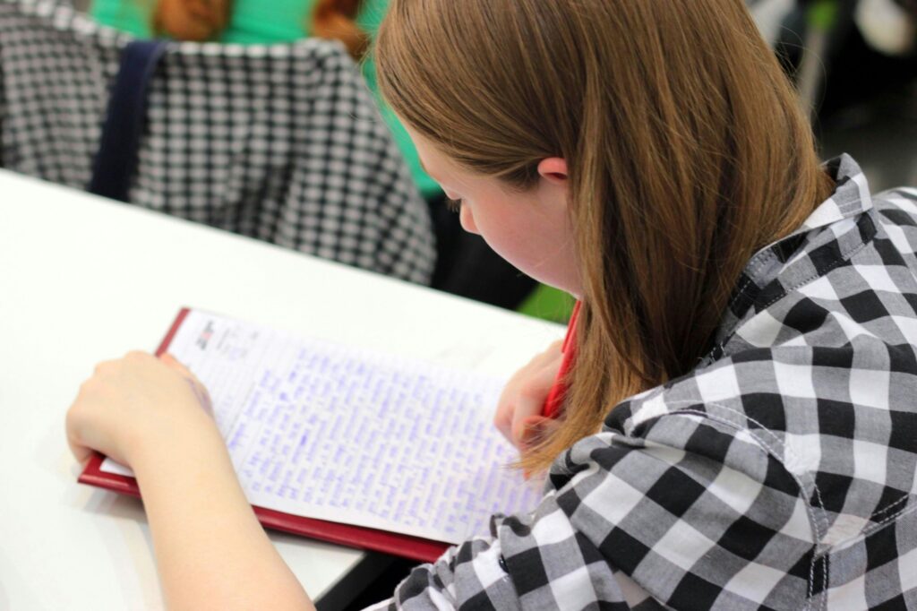 A student is working on her essay