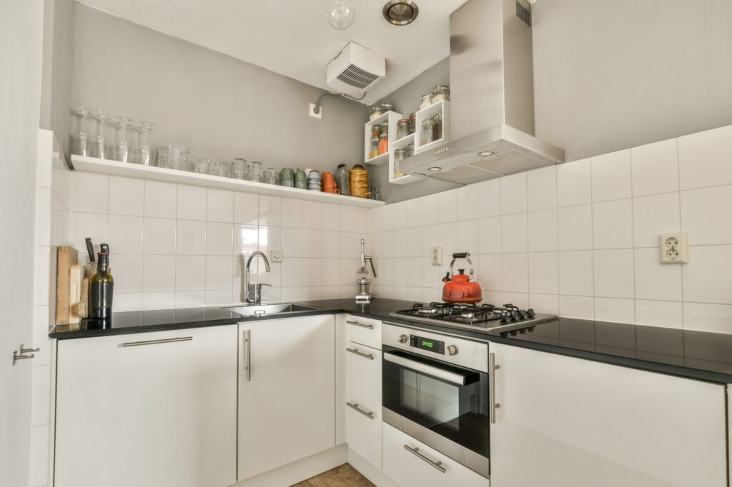 A neat kitchen with a few modern appliances